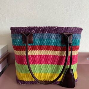 GAP Jute - outer layer woven palm leaf inner layer and brown leather straps